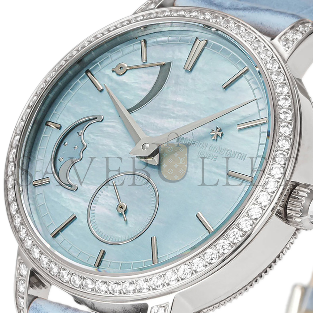 vacheron Co*sta*t*n traditionelle moon phase blue mop dial with diamond bezel in white gold on blue leather strap watch 83570/000g-9916